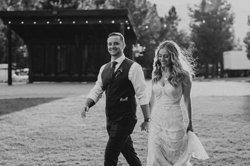 couple walking to wedding reception