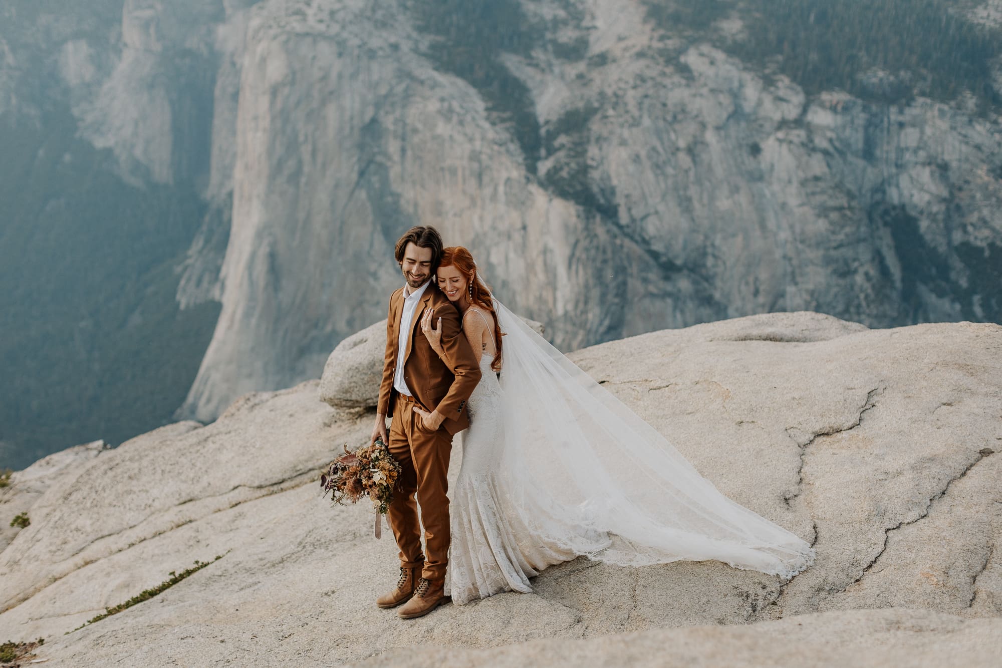 Couple elopes in Yosemite at Taft Point. How to Elope