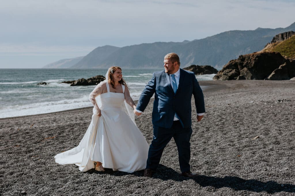 Elopement photos on black sand beach on the Lost Coast